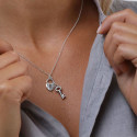 Collana placcata argento con pendenti a chiave e cuore